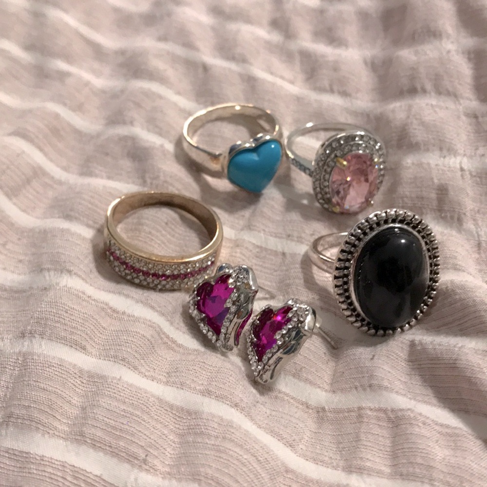 An assortment of jewelry rings that are size 9-10
